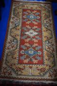 A modern Turkish style carpet, 1.5m long approx.
