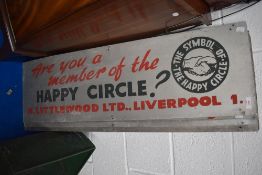 Four printed metal signs for the Happy circle.