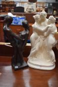 Two nude figure studies including a plaster cast and similar bronzed effect.