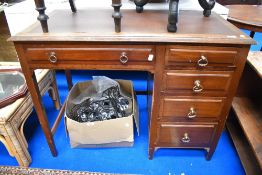 A 20th century office desk with five drawers.
