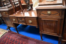 An early 20th century breakfast side board with a regency design, having cool box and wine storage