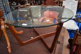 A mid century G Plan glass topped coffee table.