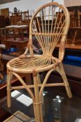 A vintage bamboo framed chair.