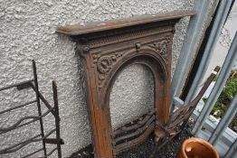 A Victorian cast iron fir place surround.