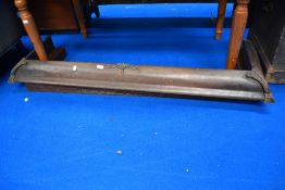 Two fire guards one in copper and one in oak.