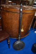 An antique bed warming pan.