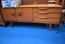 A mid century Beautility side board with drawers and cupboard.