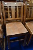 A set of six Beech framed stackable utility chairs.