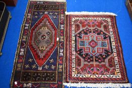 Two vintage Turkish style small hall way rugs.