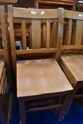A set of six Beech framed stackable utility chairs.