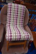 A vintage style upholstered nursing chair