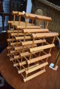 A modern pine wine rack.