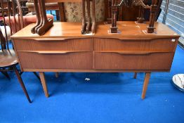 A mid century Teak effect side board with damaged top.
