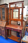 An Edwardian Mahogany hall way coat and hat stand.