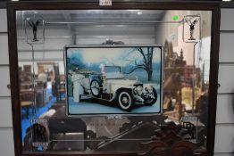 A Rolls Royce branded mirror, approx. 54 x 49cm
