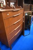 A mid century Teak G Plan chest of five drawers.