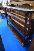 An early Victorian delft dresser back in mahogany with classical column supports.