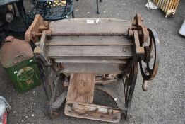 A Victorian cast iron mangle base.