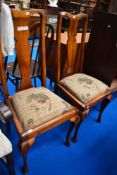 A pair of early 20th century Queen Anne style bedroom chairs