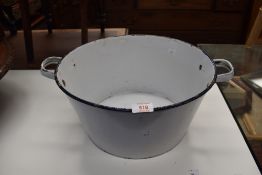 An enamel wash bowl.