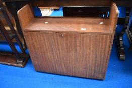 A wall mounted mid century teak bureau.