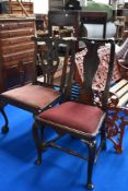 Two Victorian dining chairs one mahogany framed with vase back and a similar carved Gothic style