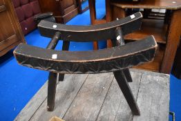 A vintage stool or barrel stand