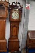 A Victorian long case clock J Pearson Louth with painted face.