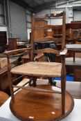 A vintage Beech wood framed and rush seated chair.