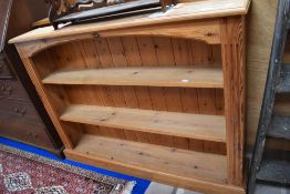A modern slim pine book shelf.