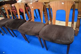 A set of four stylised mid century Scandinavian dining chairs.