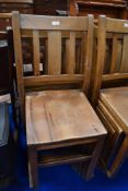 A set of six Beech framed stackable utility chairs.