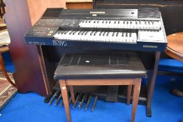 A modern Hohner G1000 electric organ.