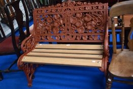 A Victorian Cast Iron Coalbrookdale Nasturnium pattern two seater bench having been restored and