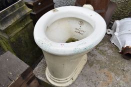 An antique Deluge toilet base.
