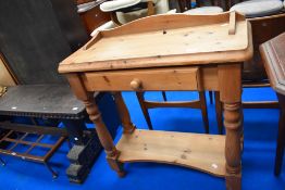 A modern pine hall table with drawer and undershelf, width approx. 74cm