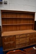 A vintage light stained hand crafted Ash wood dresser of good quality , having cupboard and drawer