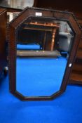 An Edwardian bevel edged mirror.