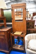 An Edwardian hall way stand in oak.