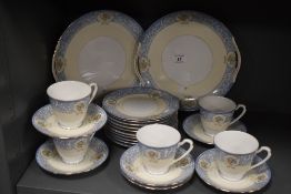 A Japanese Noritake part tea service, decorated with foliate borders, printed mark to base