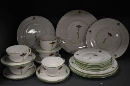 A Foley Art China 'Peacock Pottery' part teaset, decorated with a stylised Art Deco influenced