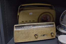 A mid century Bush radio and a Sanyo 6 transistor cordless radio.