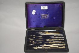 A cased Victorian drawing set, the various implements housed in a fitted and plush lined case with