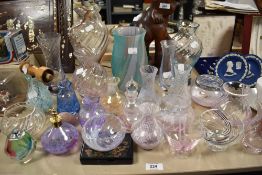 A collection of approximately twenty Caithness art glass vases.