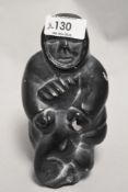 A Vintage Inuit Carved Stone Figure of a Hunter With Fish Eskimo 16cm High