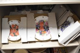 A selection of Royal Albert floral design collectors plates, with original card packaging