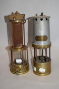 A W,H Taylor, Wigan miners lamp, of traditional design, sold along with another example with exposed
