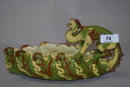 A late Victorian C.H Brannam, Barnstaple pottery shallow vase, formed as a lzard or dragon perched