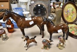 A Beswick Pottery Dartmoor pony, together with a Beswick Pottery chestnut horse and foal (both AF)