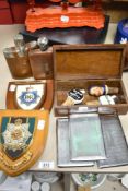 Three chromium plated cigarette cases, two armorial shields and an inlaid walnut box